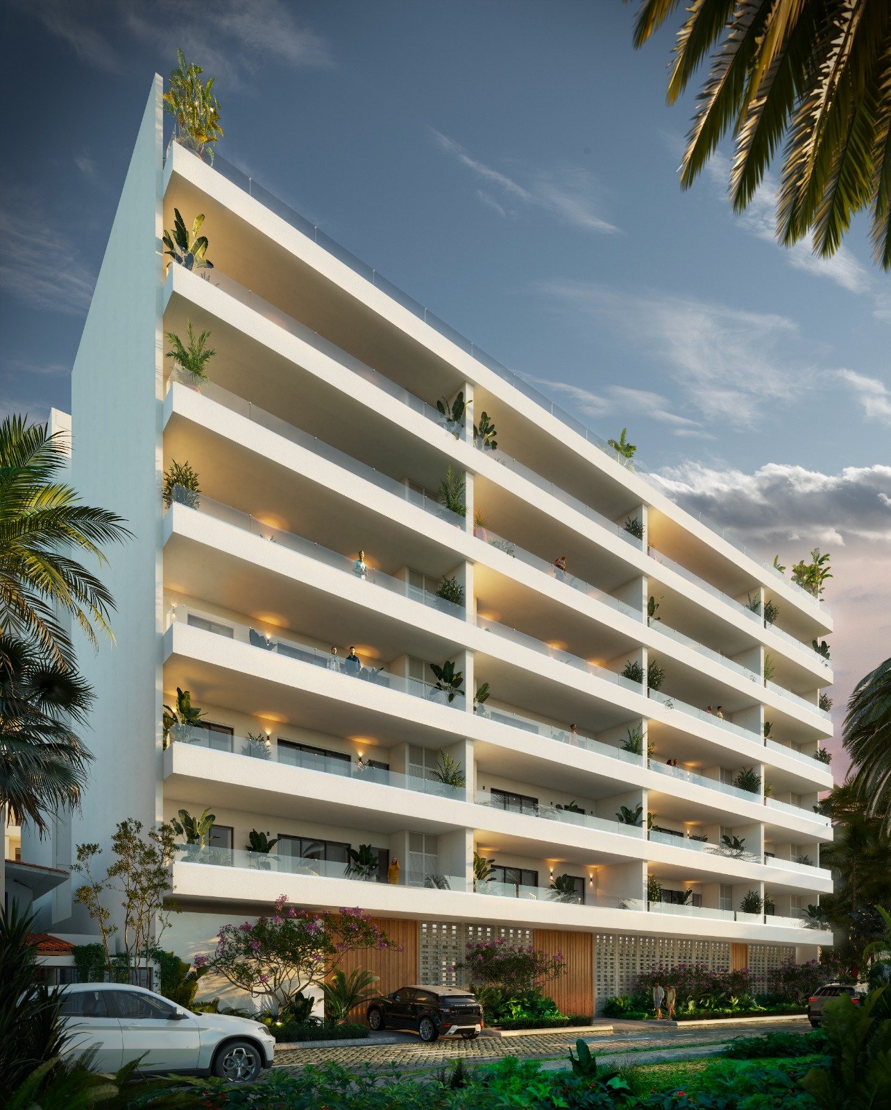 Edificio residencial blanco con terrazas continuas